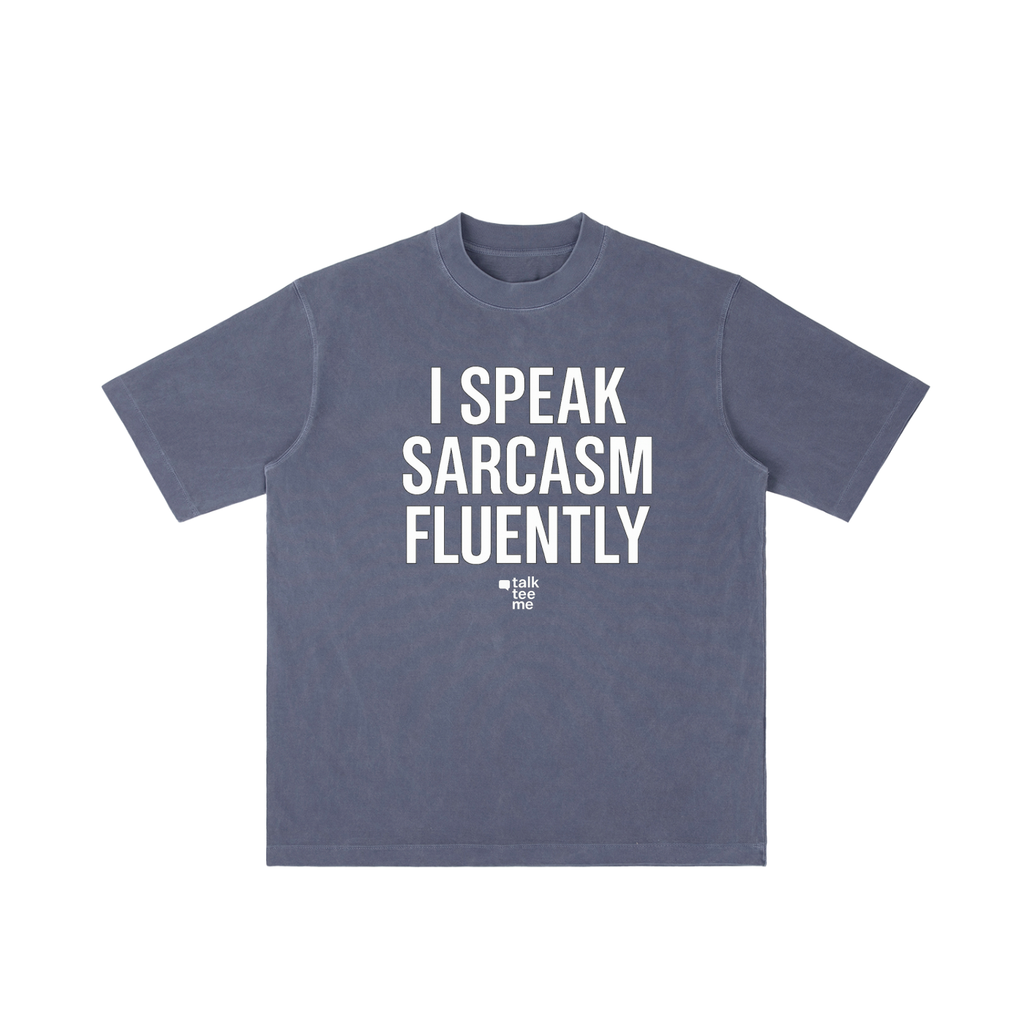 Blue t-shirt with 'I speak sarcasm fluently' text on a white background
